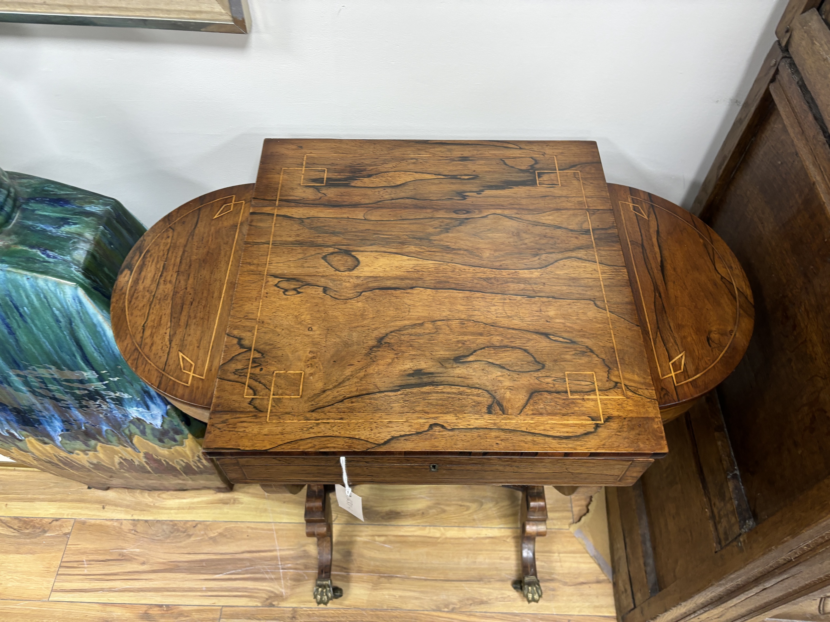 A Regency inlaid rosewood work table, width 73cm, depth 44cm, height 74cm